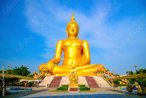 Morning sunshine at Big buddha in Wat Muang  at Ang Thong Province popular Buddhist shrine in Thailand