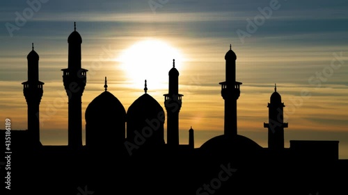 Baghdad, Iraq, Al-Kadhimiya Mosque, Kadhmain Shrine Silhouette, Time Lapse at Sunset photo