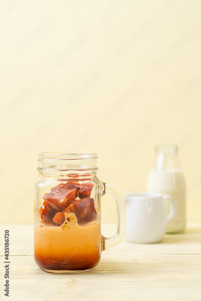 Thai tea ice cube with milk Thai tea ice cube with milk
