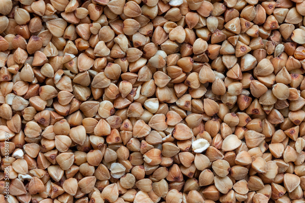 buckwheat granules scattering on a plane top view buckwheat granules scattering on a plane top view