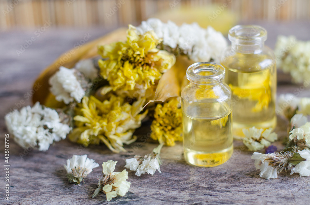 Closed up aroma gel with dry fragrance flower on grunge wooden background in spa shop Closed up aroma gel with dry fragrance flower on grunge wooden background in spa shop