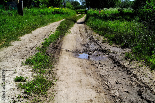 dirt road in the village © moskvich1977
