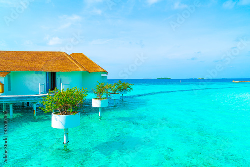 Fototapeta Naklejka Na Ścianę i Meble -  Beautiful tropical Maldives resort hotel and island with beach and sea