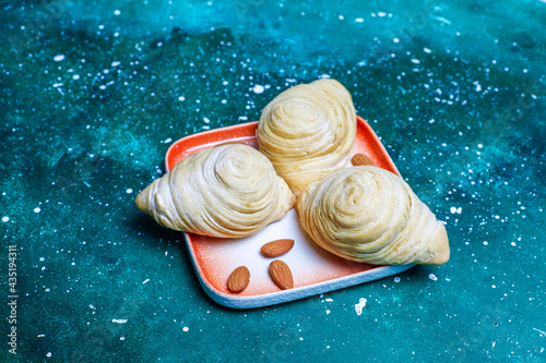 Traditional Azerbaijan holiday Novruz sweet badambura with almond. photo