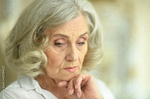 beautiful sad senior woman