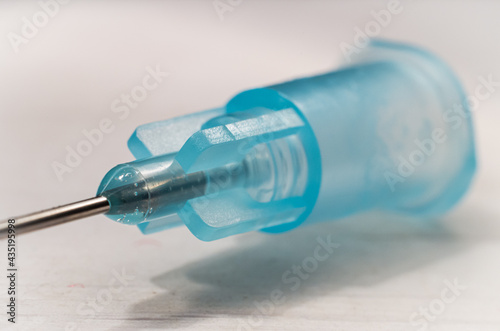 Medical IV needle hub elements. Shallow depth of field macro photography.