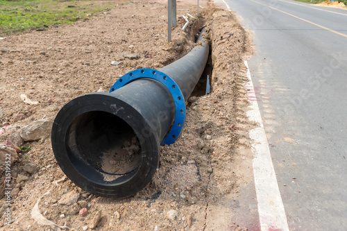 Wallpaper Mural Construction site with new Water Pipes in the ground. sewer pipes to repair or restore in street city Torontodigital.ca