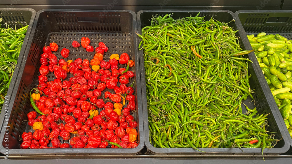 Chillies and vegetables in supermarket