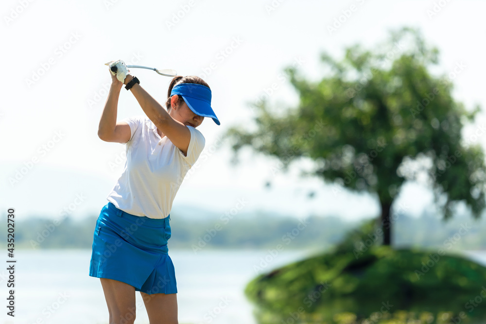 Golfer sport course golf ball fairway. People lifestyle woman playing game golf tee of on the green grass. Asia female player game shot in summer