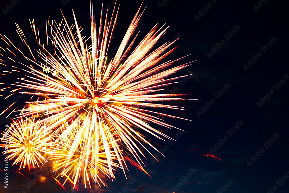 Fireworks on the background of the dark night sky. 4th July - American Independence Day Fireworks on the background of the dark night sky. 4th July - American Independence Day