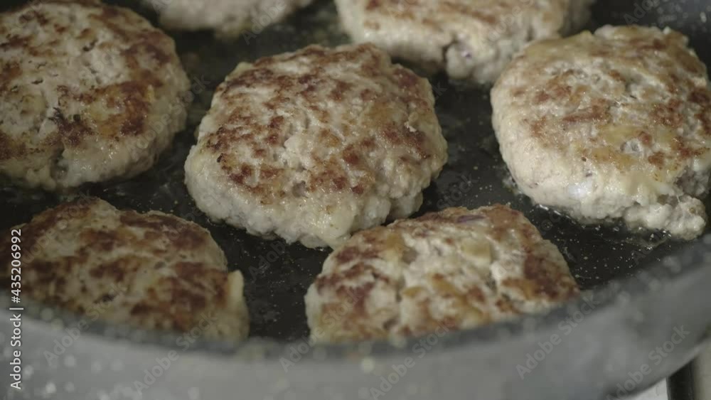 frying cutlets in a pan frying cutlets in a pan