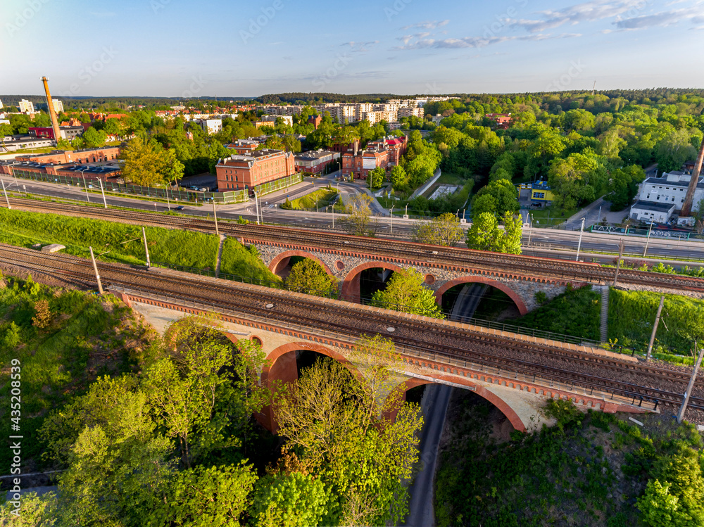 Fototapeta premium Complex of railway bridges over the Łyna River in Olsztyn - spring, Warmia and Mazury, Europe