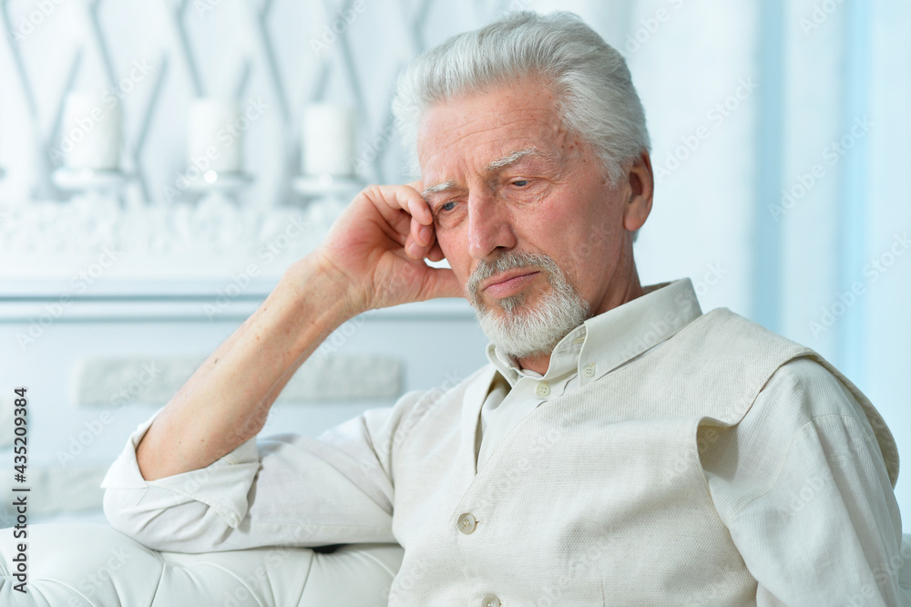 Close up portrait of thoughtful senior man Close up portrait of thoughtful senior man