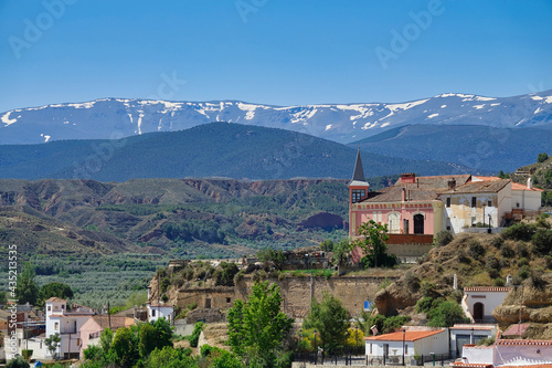 View of the Palace of the Gallardo in Marchal (Granada - Spain) with Sierra Nevada in the background. It is a pink stately house known as "Casa Grande", "Casa del Amo" or "Casa Rosa" © Miguel Ángel RM