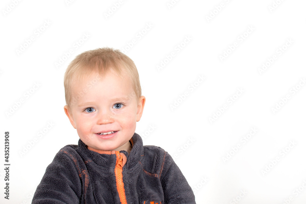 Portrait of little caucasian boy. Smiling baby face with white teeth isolated on white background. Portrait of little caucasian boy. Smiling baby face with white teeth isolated on white background.