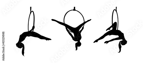 Strong acrobat in the hoop. Set of woman silhouettes in the aerial ring. Vector illustration isolated in white background photo