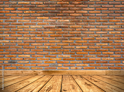 Brown brick wall texture and wood floor. Interior concept