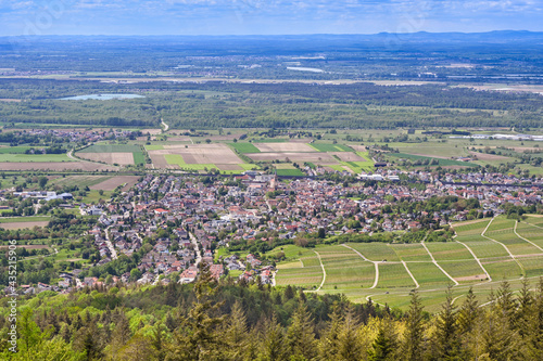 View from Fremersberg to the town of Sinzheim with the Rhine valley near Baden Baden. In the background the Vosges. Baden Wuerttemberg, Germany