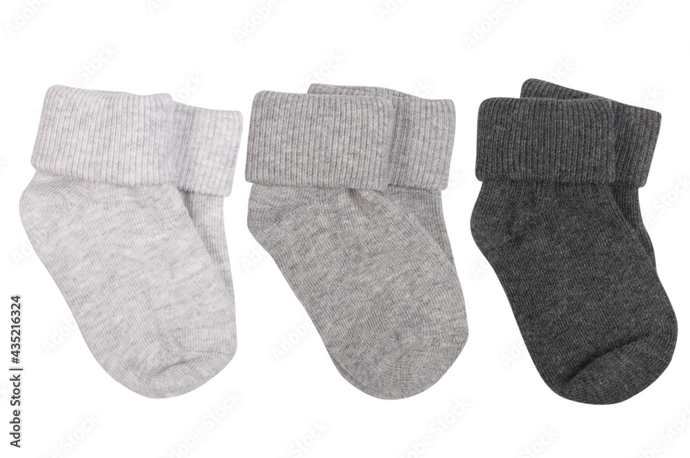three pairs of gray socks for baby isolated on white three pairs of gray socks for baby isolated on white