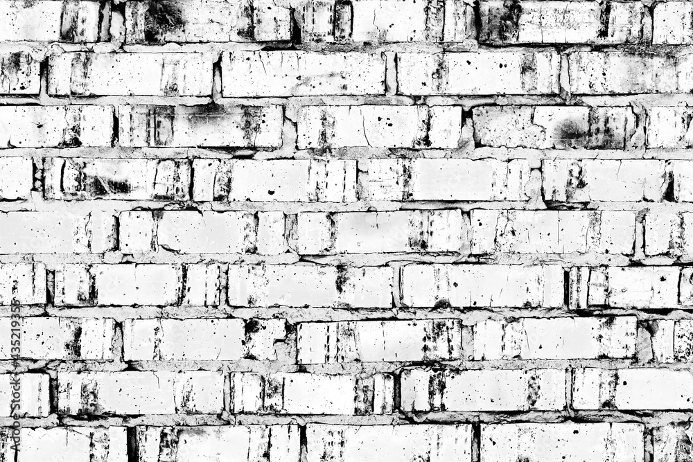 Obraz premium Texture of a brick wall with cracks and scratches which can be used as a background