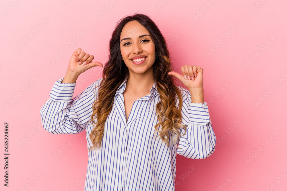 Young mexican woman isolated on pink background feels proud and self confident, example to follow. Young mexican woman isolated on pink background feels proud and self confident, example to follow.
