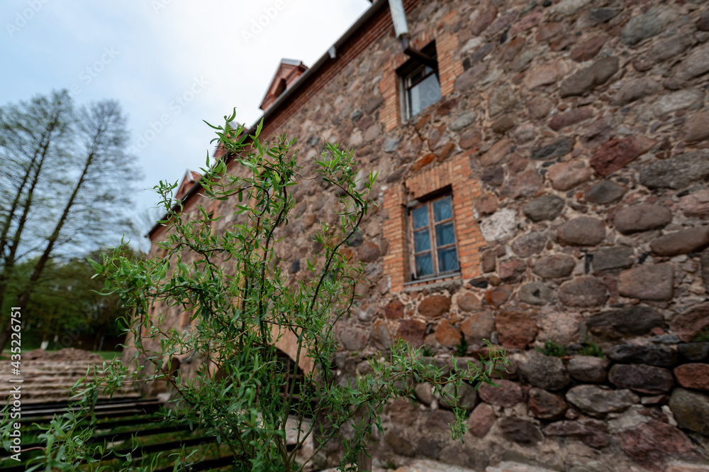 An old mill of the 19th century with a restoration in the village of Dvorishche