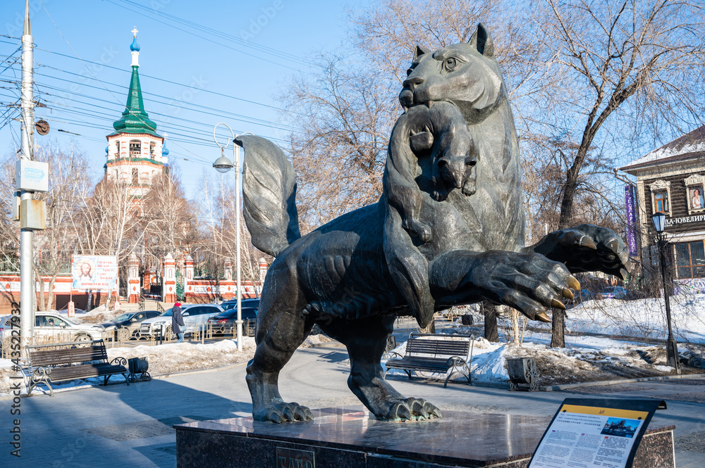 Irkutsk, Russia : 03-03-2020 : The bronze statue of Irkutsk "Babr" this bizarre beaver-tiger hybrid located in city downtown and became the symbol on coat of arms of Irkutsk town. Stock Photo |