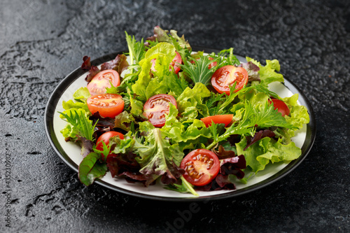 Fresh cherry tomatoes salad. healthy vegan food