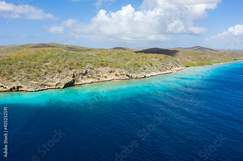 Aerial view above scenery of Curacao, Caribbean with ocean, coast and beach