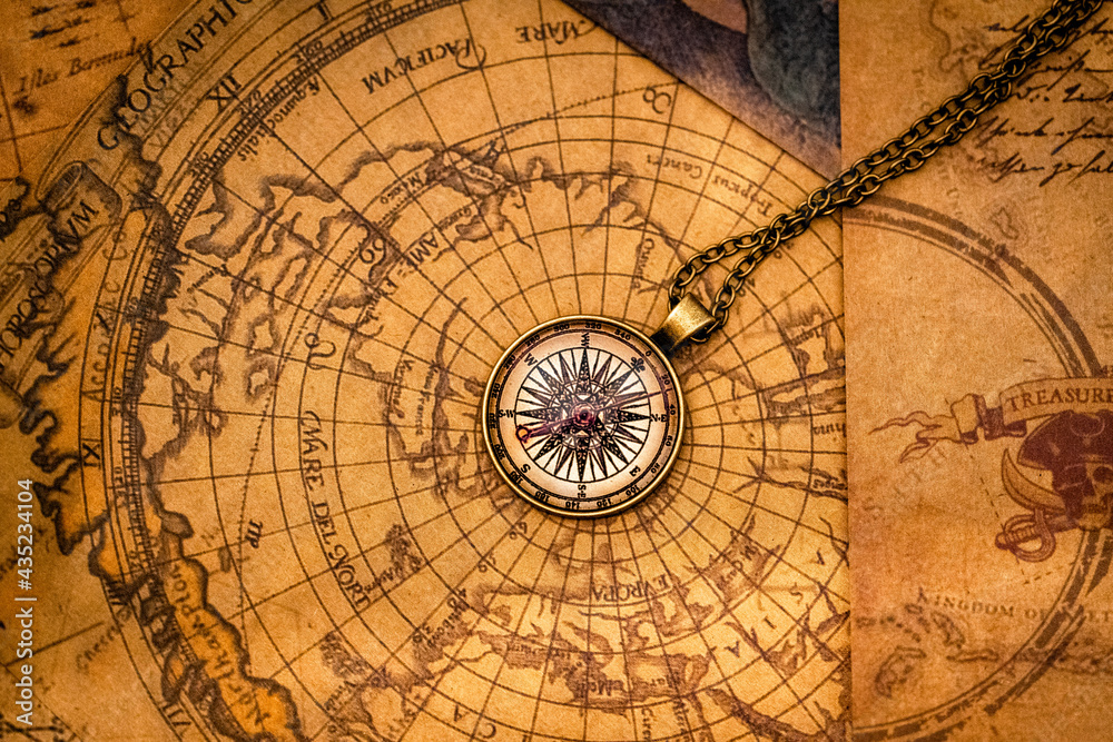 vintage map and compass on the table