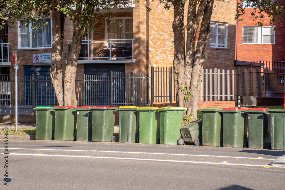 Australian garbage wheelie bins with colourful lids for general and