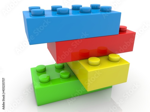 Colored toy bricks connected on top of each other