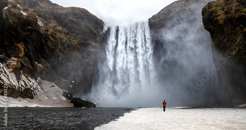 Photos Skogafoss waterfall with solitary person