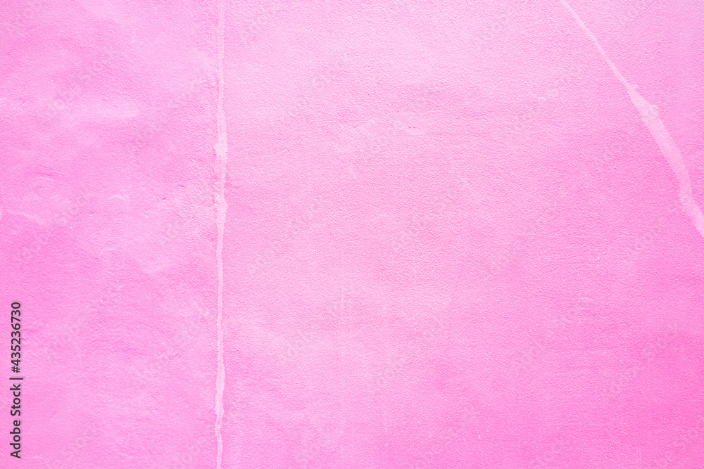 Fototapeta premium Texture of a painted Pink shabby concrete wall