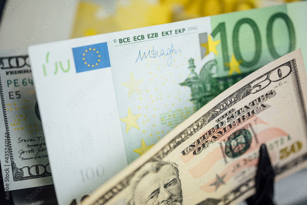 Money background. USA dollar with Euro Banknotes and Bitcoin cryptocurrency investing concept. Money background. USA dollar with Euro Banknotes and Bitcoin cryptocurrency investing concept.