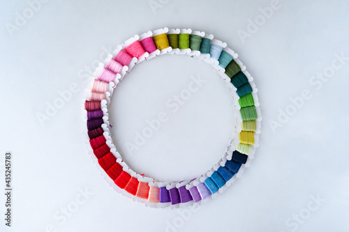 Word DIY world made of colorful bobbins, treads. Do it yourself concept. Sewing, hobby