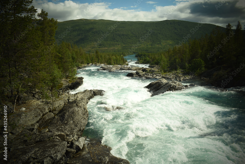 River rapids in mountain landscape in sunny weather, scenery River rapids in mountain landscape in sunny weather, scenery