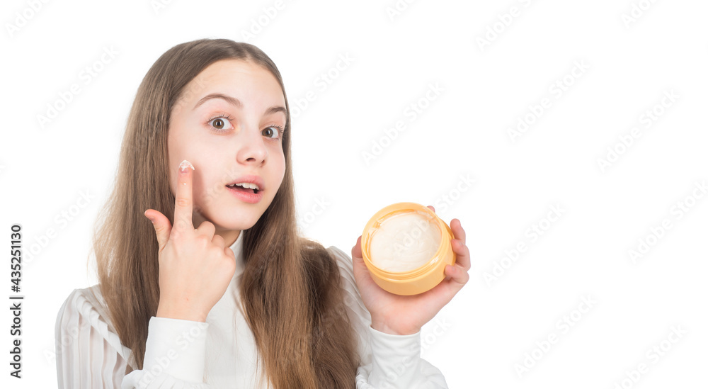 happy child presenting beauty cosmetic product of facial skin cream isolated on white, nourishing happy child presenting beauty cosmetic product of facial skin cream isolated on white, nourishing