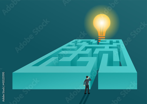 Confused man in labyrinth and lamp as solution