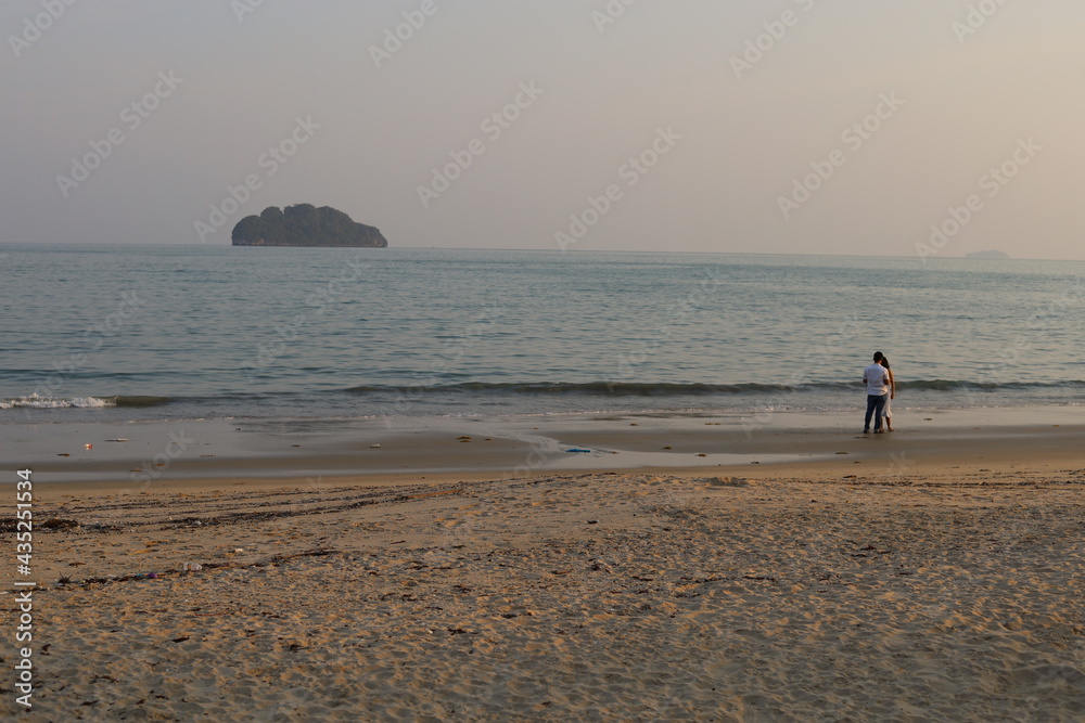 couple walking on the beach