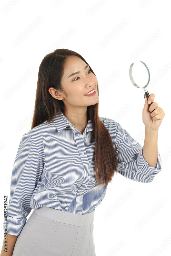 Portrait of young beautiful Asian woman with long dark brown hair holding magnifying glass isolated on white background Portrait of young beautiful Asian woman with long dark brown hair holding magnifying glass isolated on white background