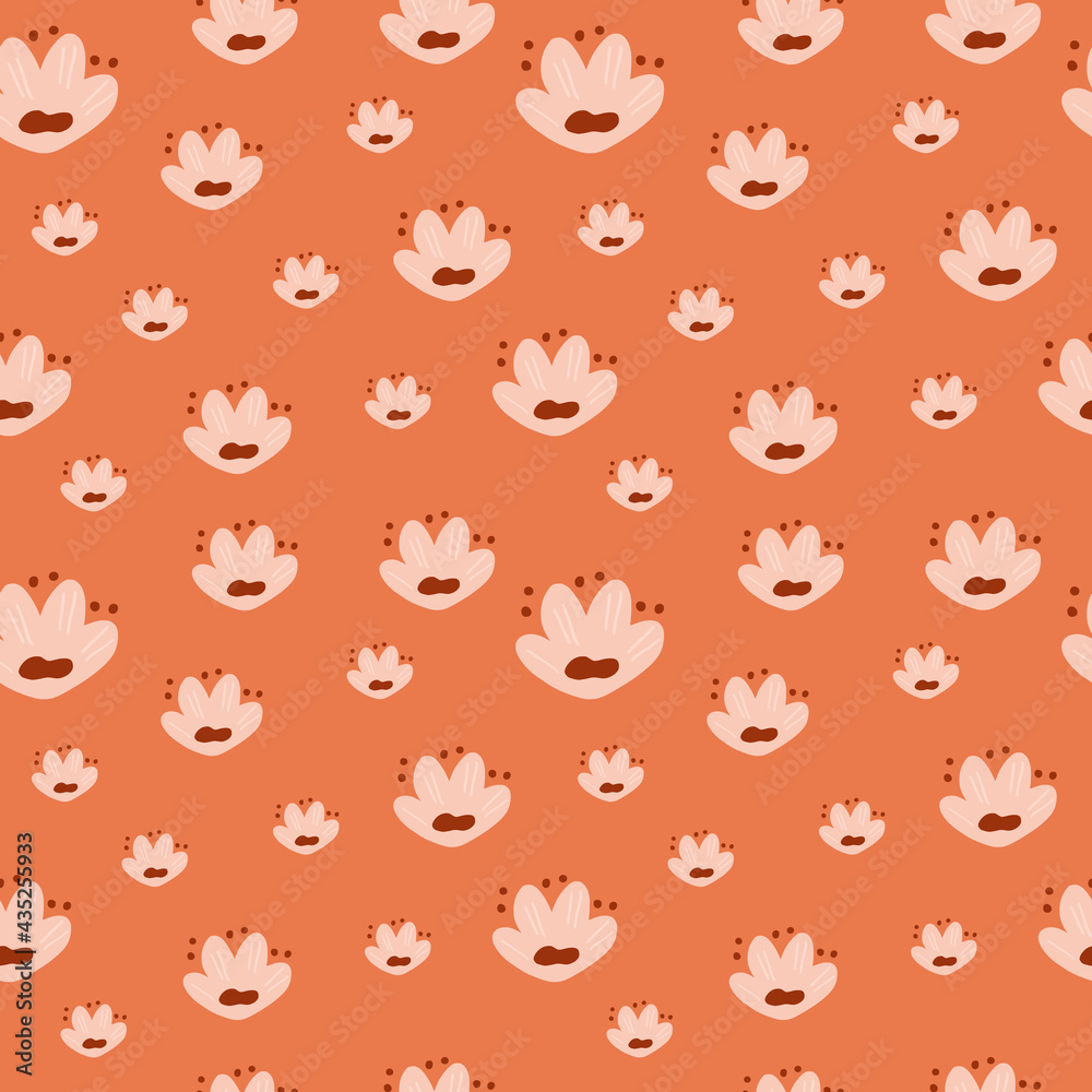 Fototapeta premium Random little pink doodle flowers silhouettes seamless pattern. Orange background. Decorative print.