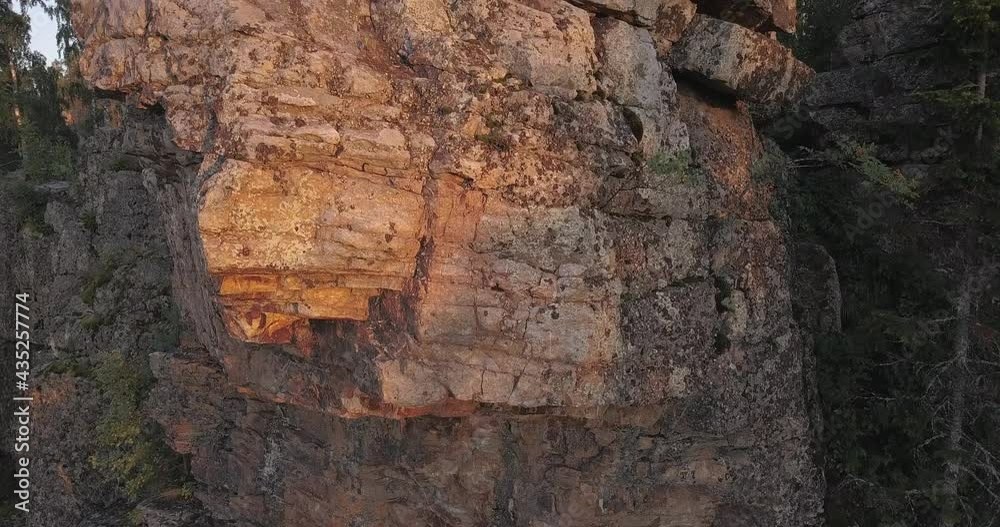Flying along scenic rock at Ural mountains. Aigir rocks at Beloretsk region of Bashkortostan Flying along scenic rock at Ural mountains. Aigir rocks at Beloretsk region of Bashkortostan