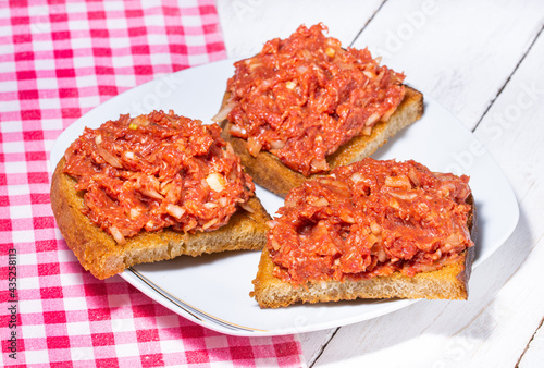 Czech toasted bread smeared with steak tartare. typically Czech served