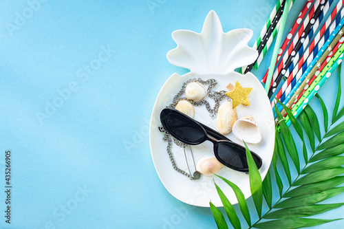 summer background palm straw hat, sunglasses  tropical leaf relax accessories summer vacation positive mood vacation top view