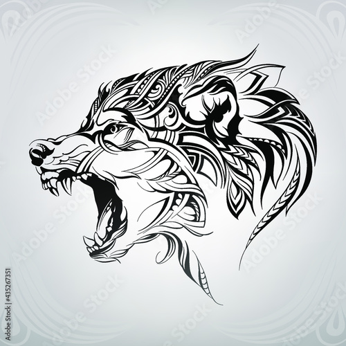 The head of a wolf in a floral ornament