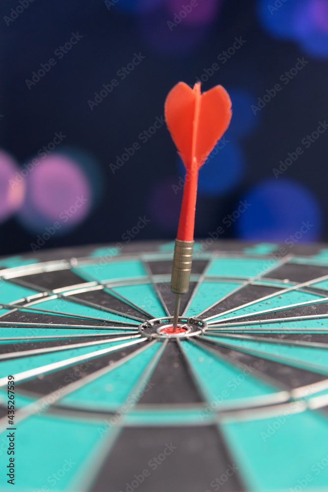Fototapeta premium Bullseye is a target of business. Dart is an opportunity and Dartboard is the target and goal. So both of that represent a challenge in business marketing as concept. 