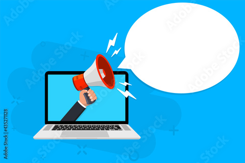 Hand holding megaphone coming out from laptop. Digital marketing, internet targeted, promotional campaign, online notification, e-marketing, internet promo, online advertisement. laptop with megaphone