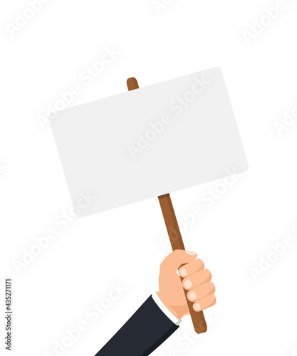 Human hand holding empty placard for banner design. Protest, political revolution, demonstrate, billboard. Poster banner design. Street demonstration concept. Struggle for rights concept