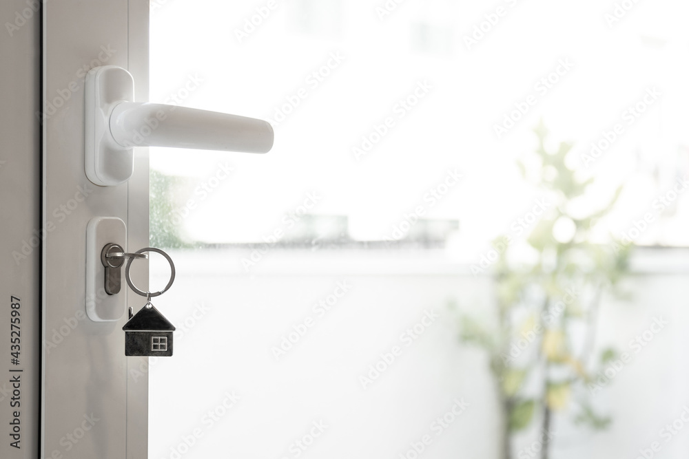 keys in the lock of the house door keys in the lock of the house door